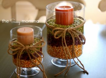 Fall centerpieces using corn and other grains and a candle