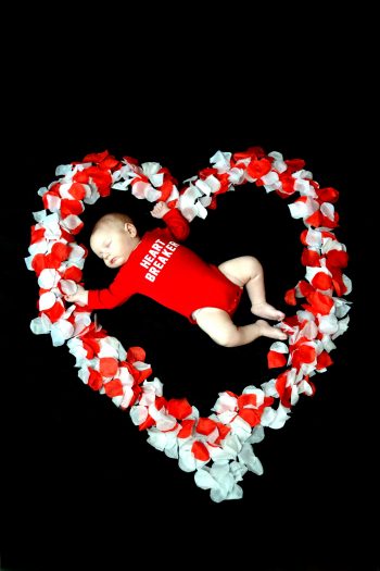 If you're looking for something cute to do on Valentine's Day this year, why not have a Valentine's photoshoot? Your baby will look so adorable. 