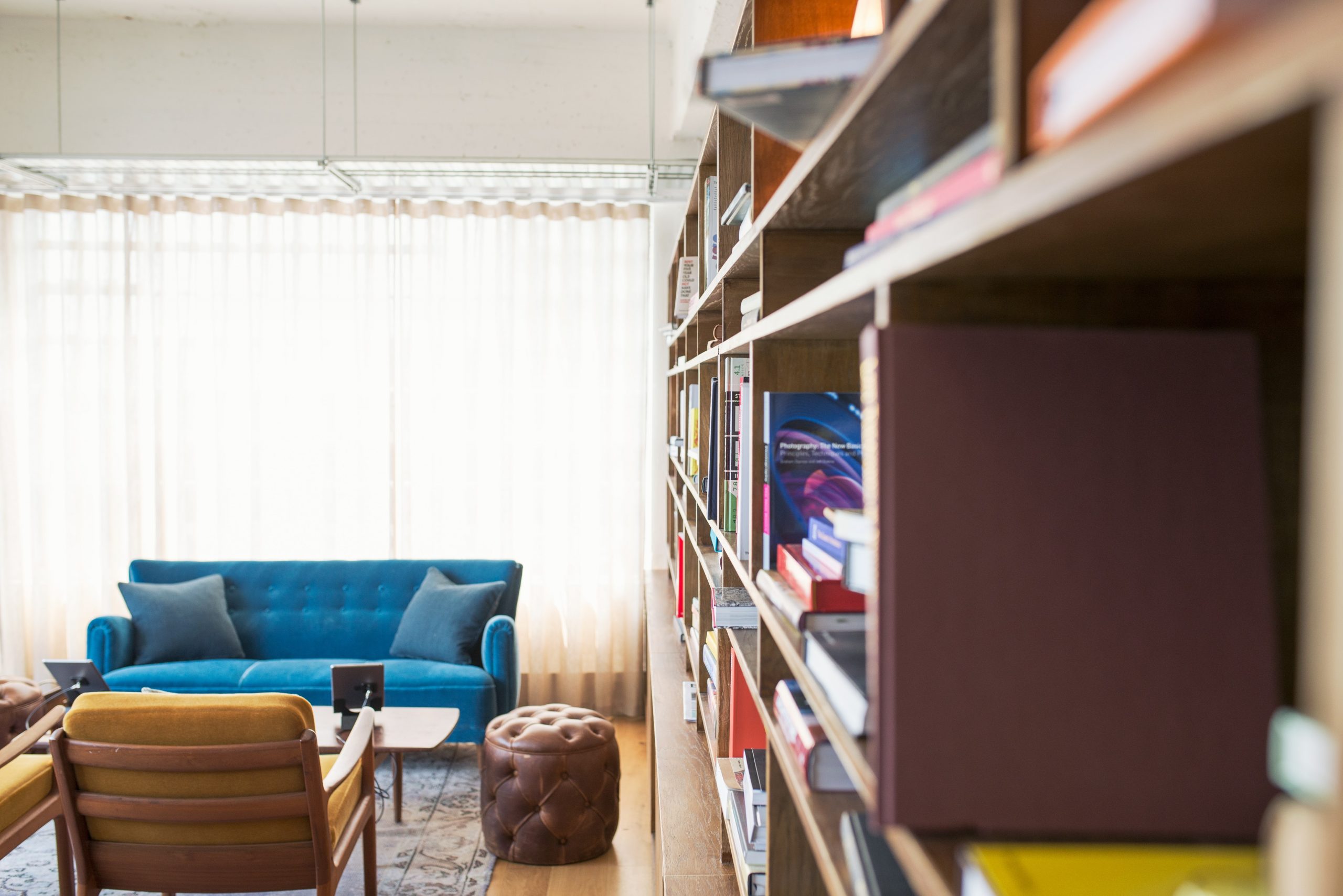 Have you heard of the book nook trend? A book nook is a cute little insert that tucks between the books on your bookshelf. It's basically a whole new (miniature!) world on your bookshelf. Pretty cool, right? Look here to see how to create a cozy book nook. 