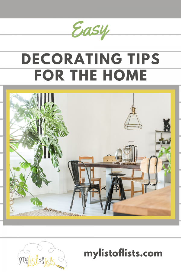 Easy Decorating Tips for the home using large plants. Dining room with table and chairs and large plant in corner.